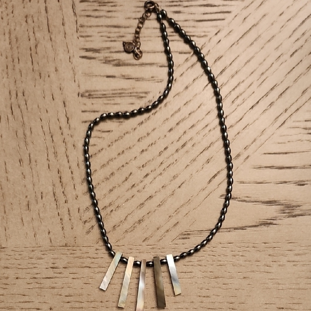Geometric Black and Gold Necklace with Minimalist Design - Picture 2 of 3